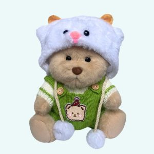 Nino – L’ours en peluche articulé fait main avec combinaison tricoté verte